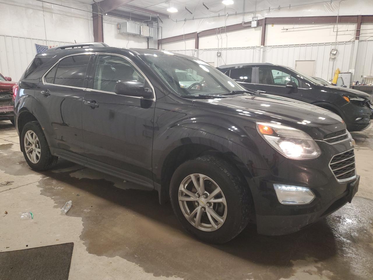 2017 Chevrolet Equinox VIN 2GNFLFE39H6259698 Copart auction photo, front end / side damage thumbnail 4