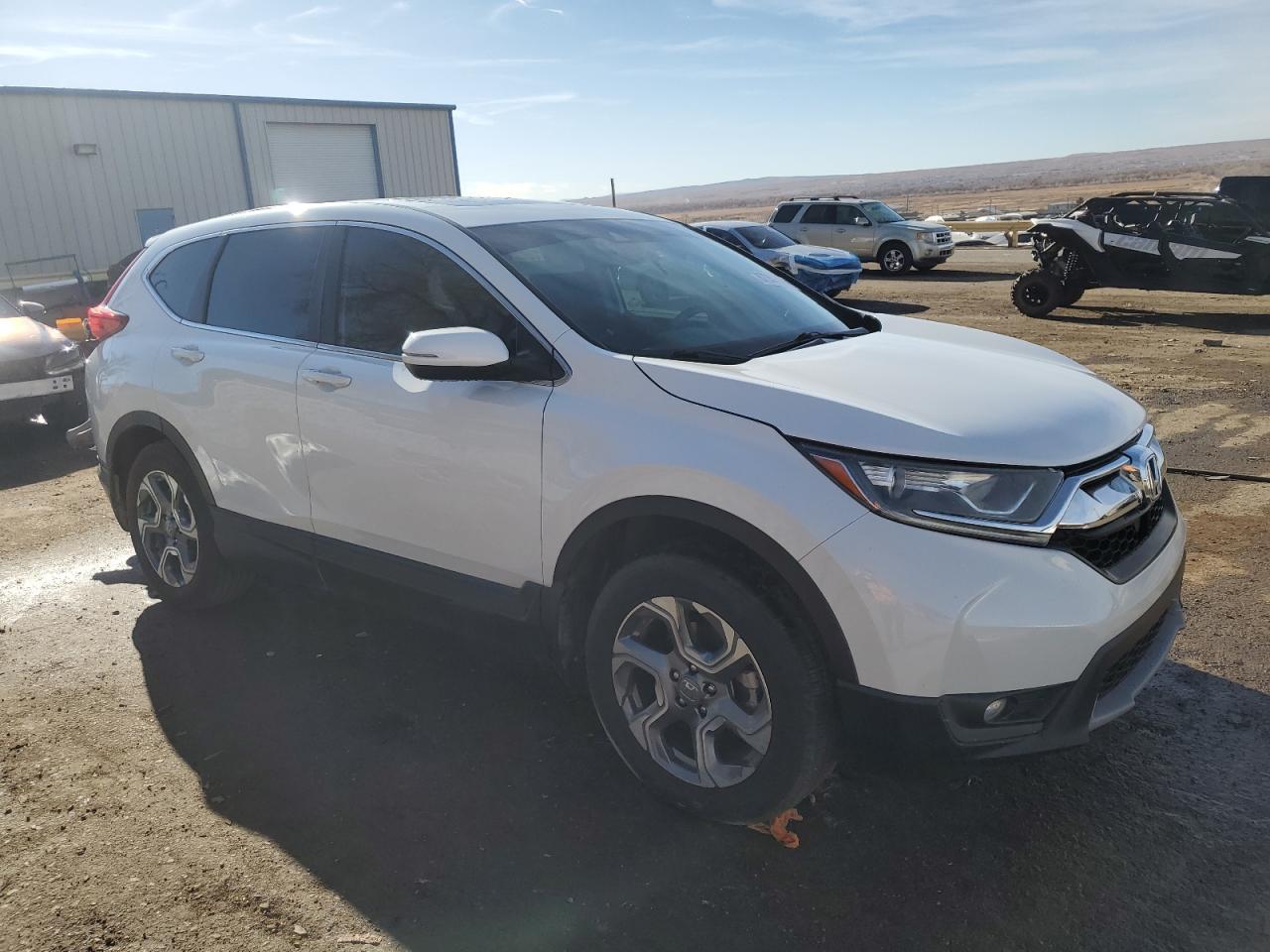 2019 Honda CR-V VIN 5J6RW2H52KA012630 Copart auction photo, side / front end damage thumbnail 4
