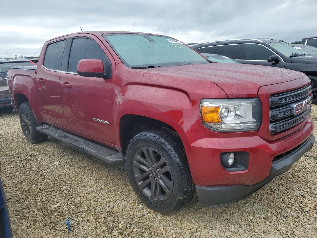 2019 GMC Canyon VIN 1GTG6CEN7K1350371 Copart auction photo, water/flood damage thumbnail 4