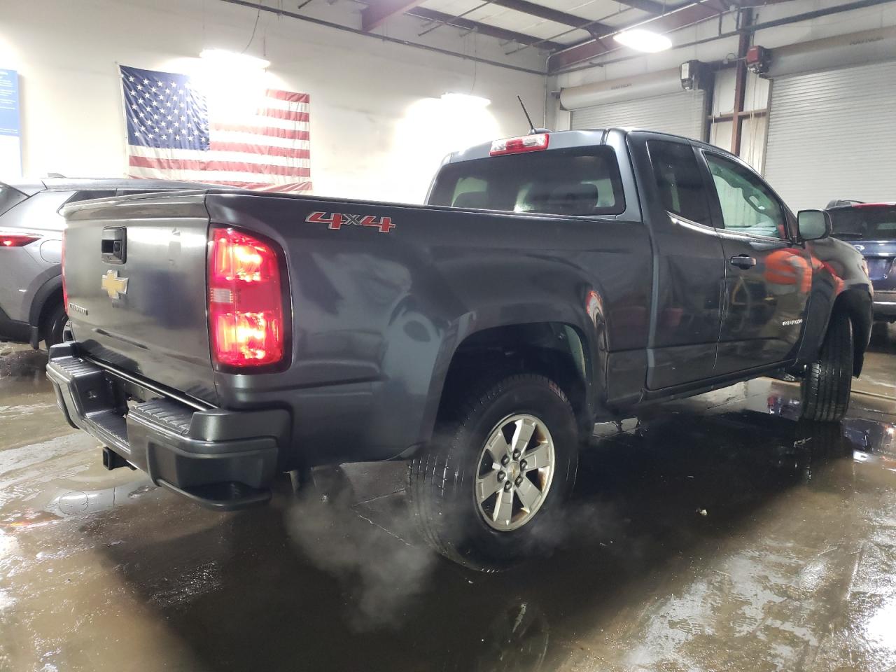 2015 Chevrolet Colorado VIN 1GCHTAE38F1243528 Copart auction photo, front end / side damage thumbnail 3