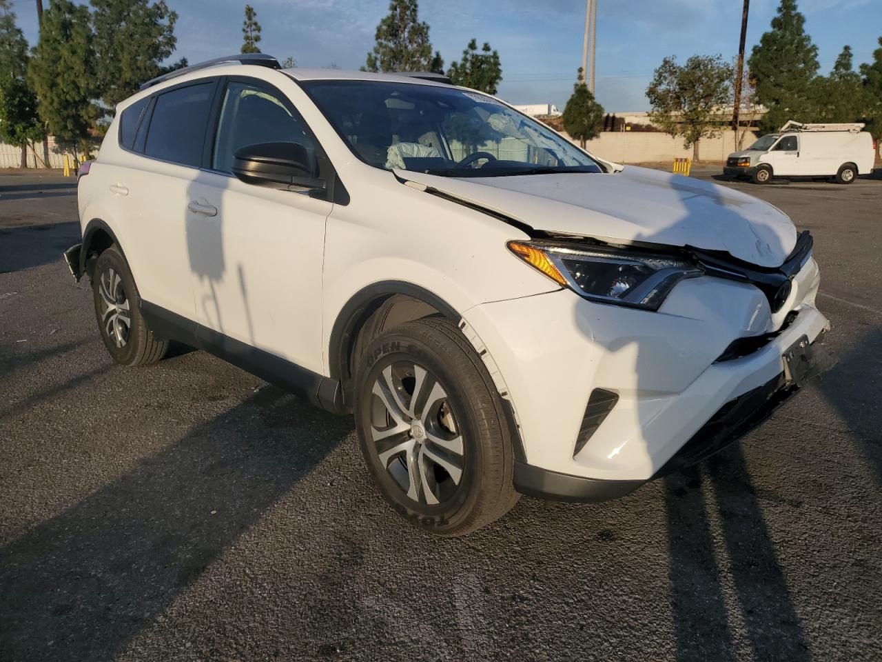 2018 Toyota RAV 4 VIN JTMZFREV8JJ185814 Copart auction photo, front end / rear end damage thumbnail 4