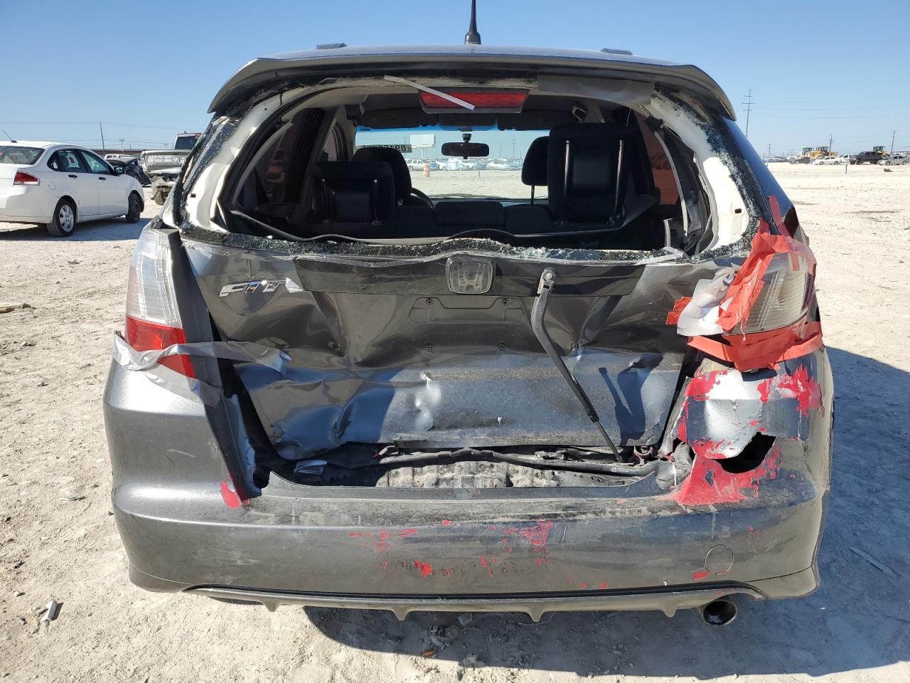 2011 Honda Fit VIN JHMGE8H57BS007807 Copart auction photo, rear end damage thumbnail 6
