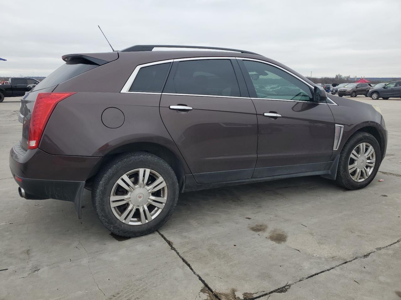 2015 Cadillac SRX VIN 3GYFNAE3XFS535210 Copart auction photo, front end / side damage thumbnail 3