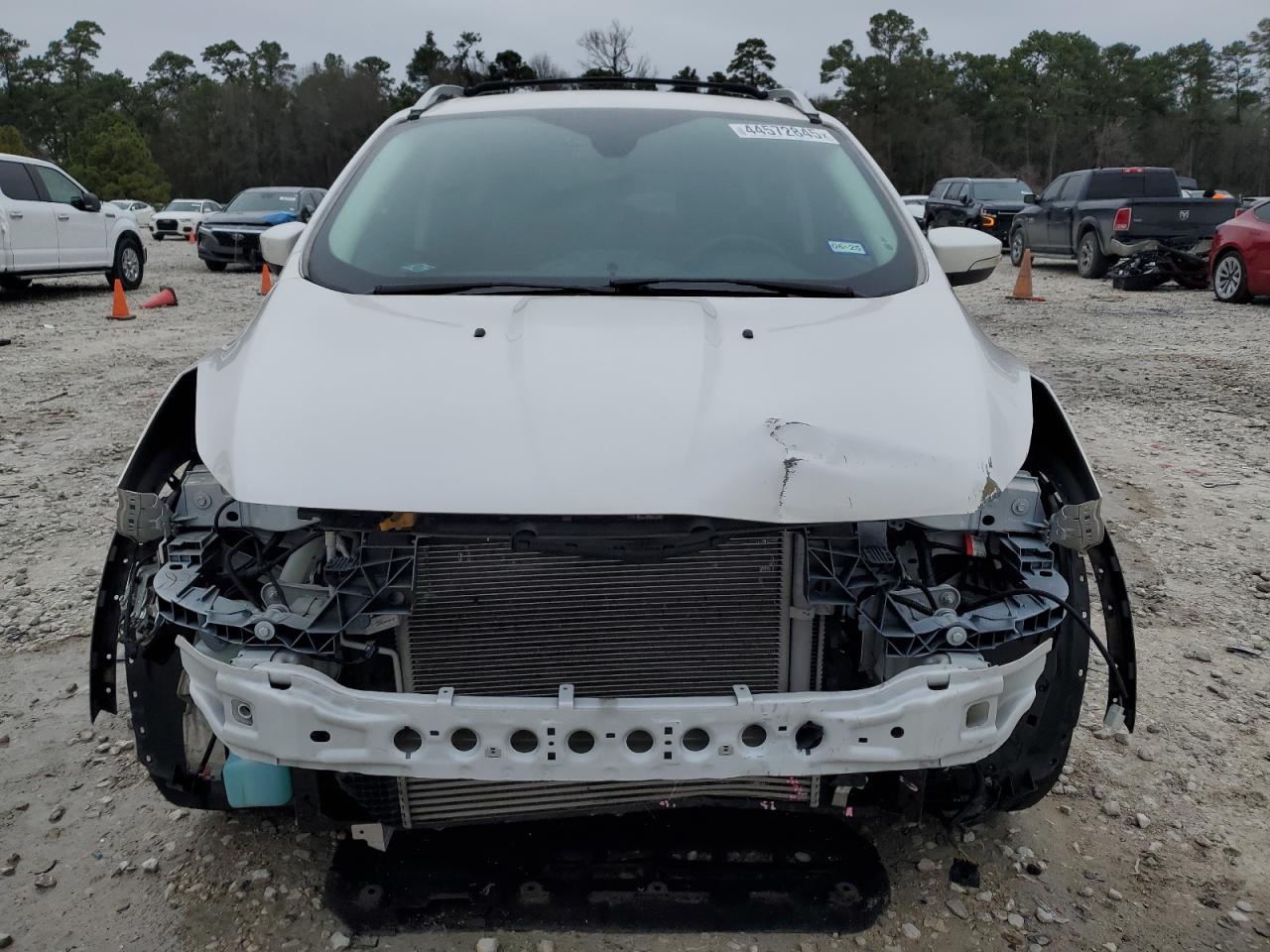 2016 Ford Escape VIN 1FMCU0JX1GUC66011 Copart auction photo, front end / normal wear damage thumbnail 5