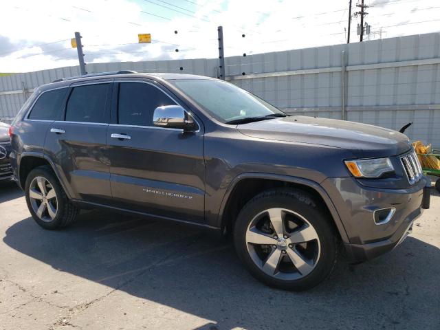 2015 Jeep Grand Cherokee VIN 1C4RJFCG5FC759329 Copart auction photo, hail / rear end damage thumbnail 4