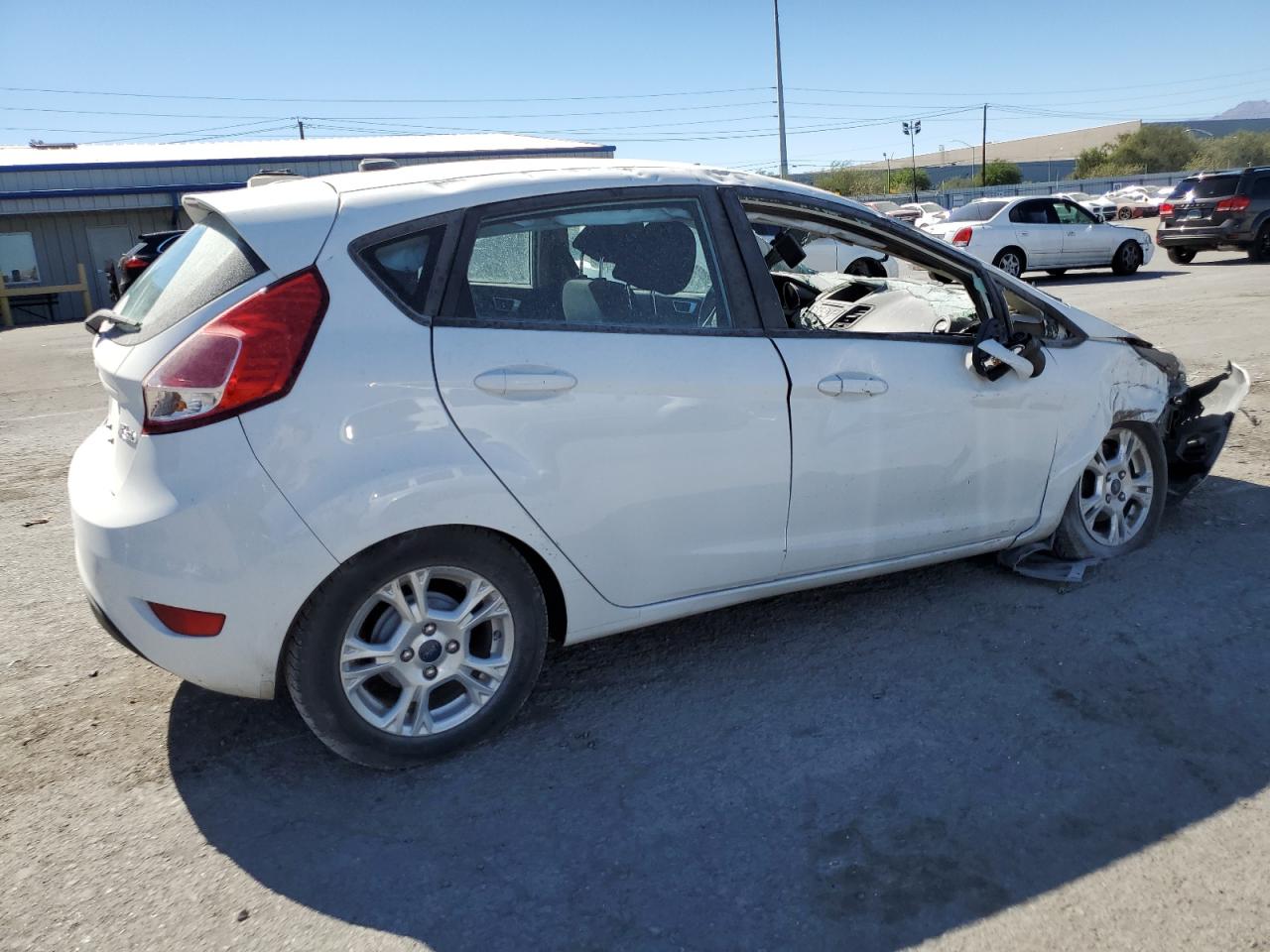 2015 Ford Fiesta VIN 3FADP4EJ6FM217246 Copart auction photo, all over damage thumbnail 3