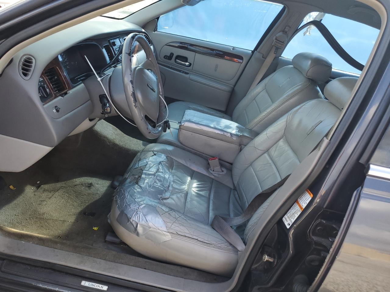 1999 Lincoln Town Car VIN 1LNHM81W4XY714116 Copart auction photo, side / minor dent/scratches damage thumbnail 7