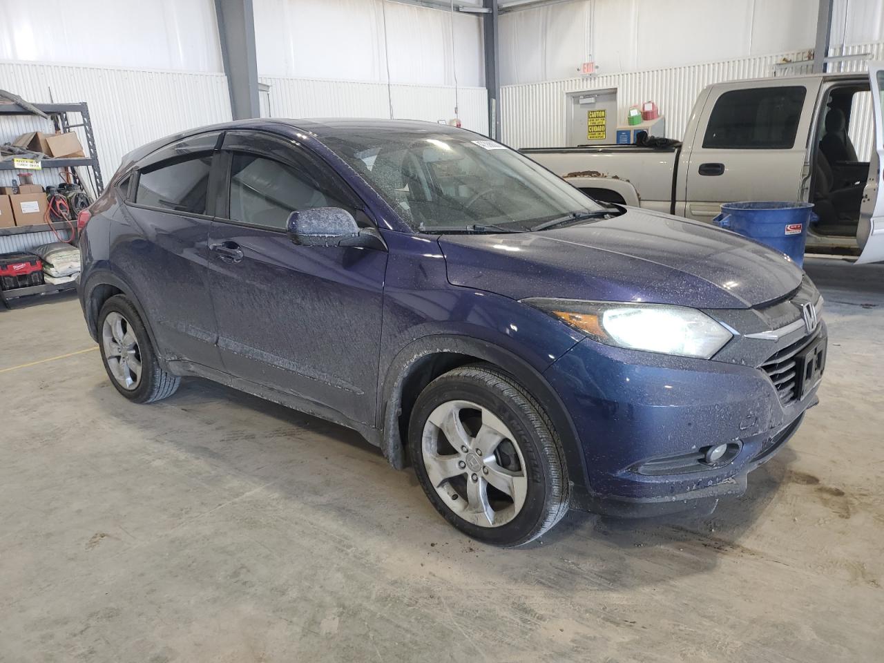 2016 Honda HR-V VIN 3CZRU6H31GM716520 Copart auction photo, side / rear end damage thumbnail 4