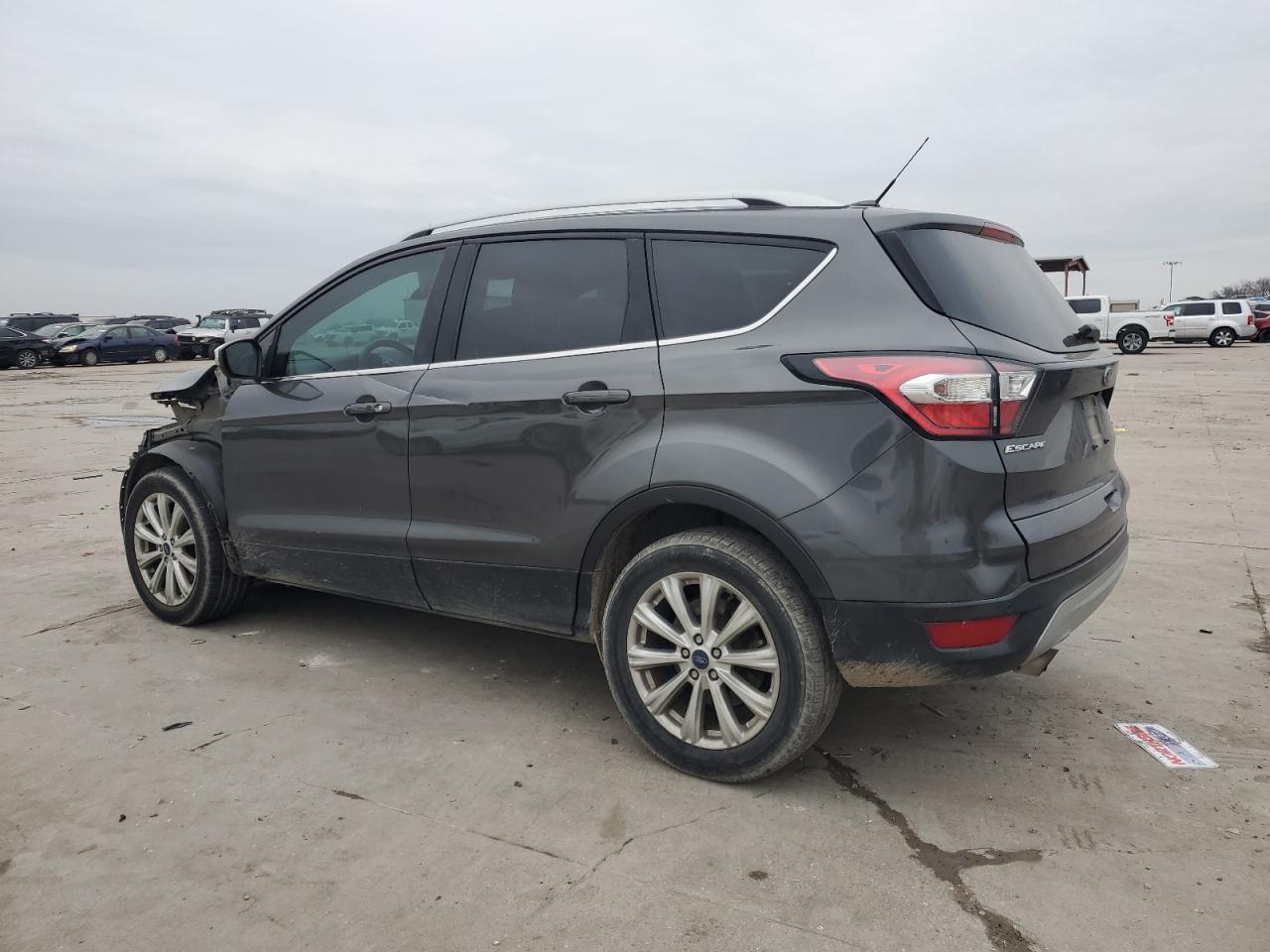 2017 Ford Escape VIN 1FMCU9J99HUE71972 Copart auction photo, front end / minor dent/scratches damage thumbnail 2