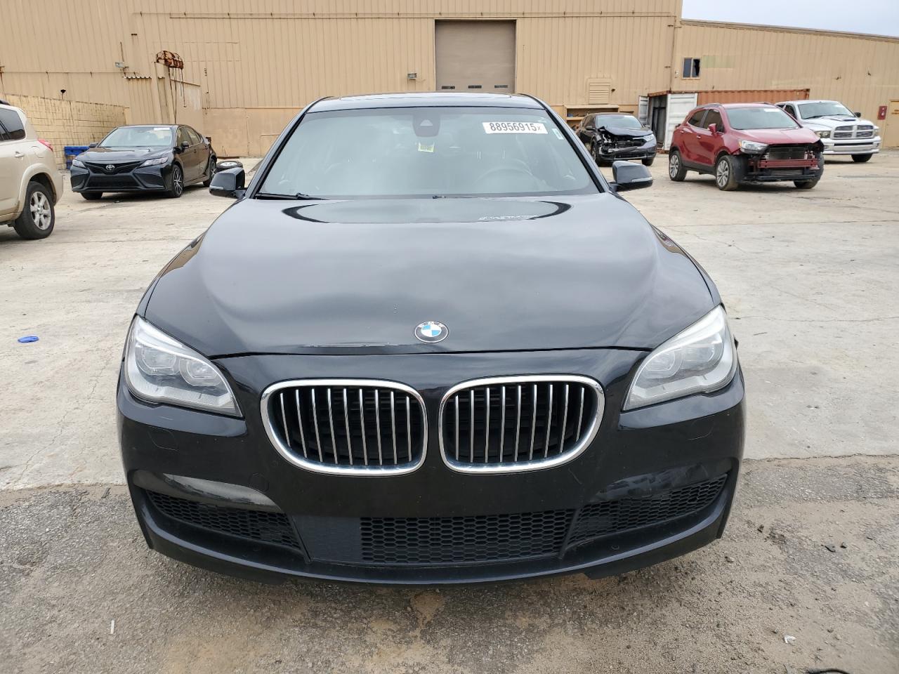 2015 BMW 7er VIN WBAYF8C52FD655024 Copart auction photo, side damage thumbnail 5
