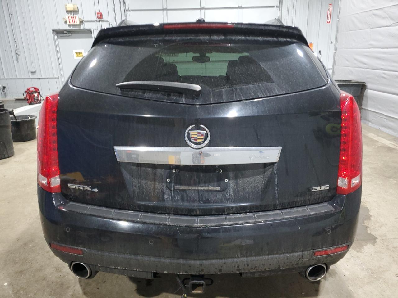 2015 Cadillac SRX VIN 3GYFNEE38FS610316 Copart auction photo, front end / minor dent/scratches damage thumbnail 6