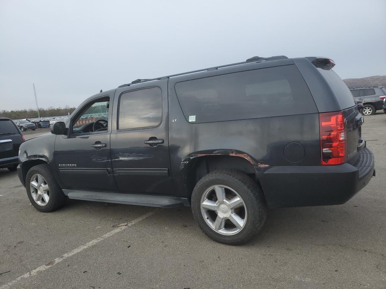 2012 Chevrolet Suburban VIN 1GNSKJE73CR172996 Copart auction photo, front end / side damage thumbnail 2