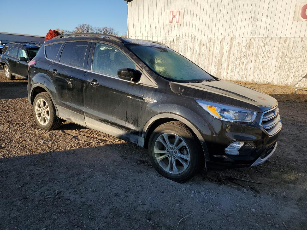 2018 Ford Escape VIN 1FMCU0GD8JUD18724 Copart auction photo, side / minor dent/scratches damage thumbnail 4