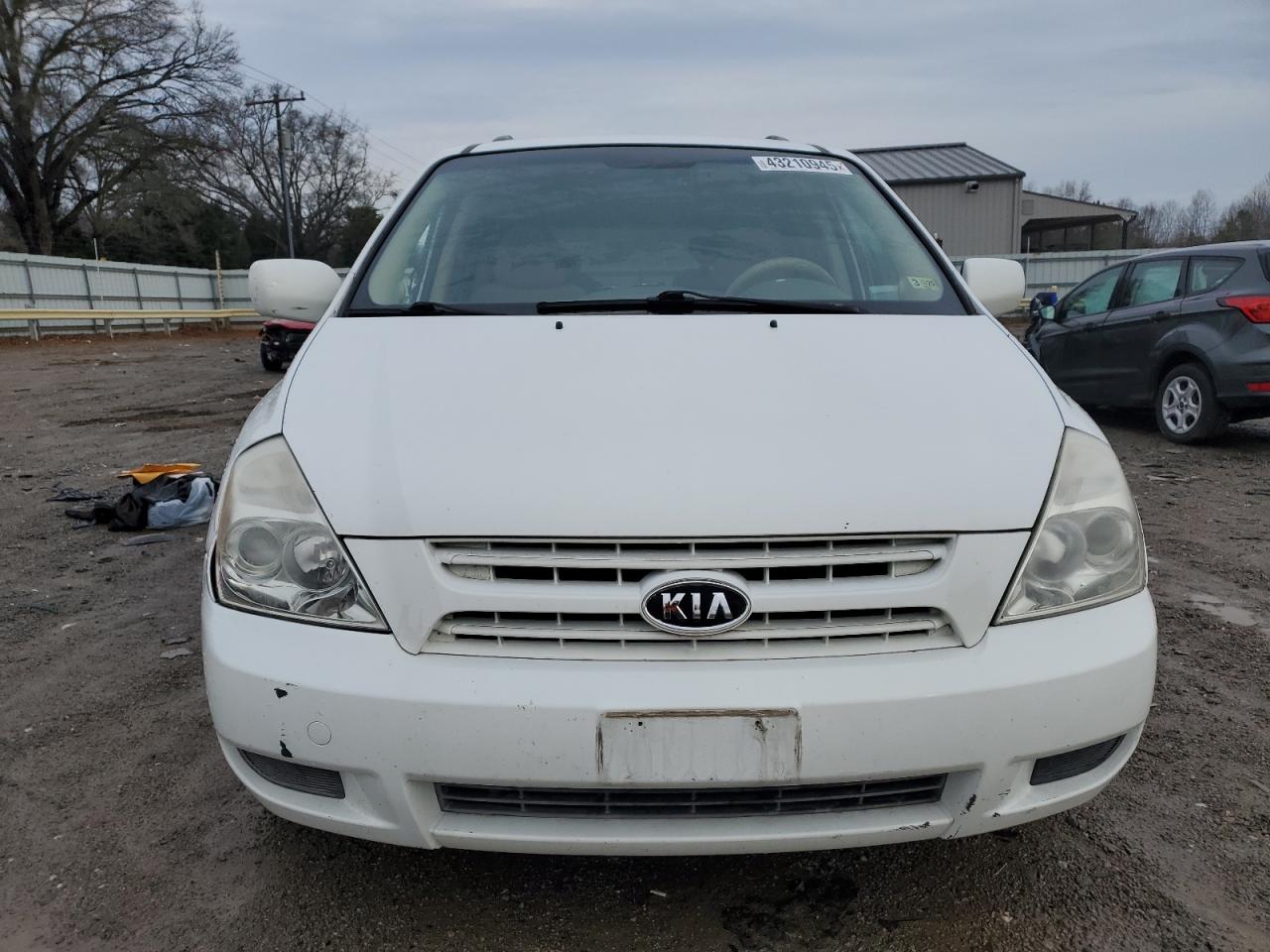 2010 KIA Sedona VIN KNDMG4C38A6339159 Copart auction photo, side damage thumbnail 5