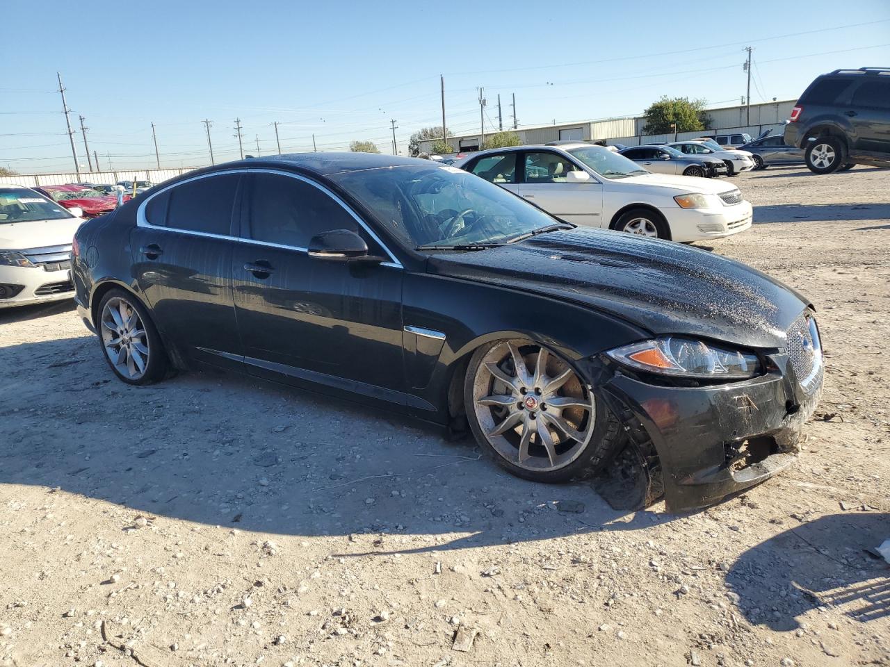 2015 Jaguar XF VIN SAJWA0HP4FMU76117 Copart auction photo, front end / minor dent/scratches damage thumbnail 4