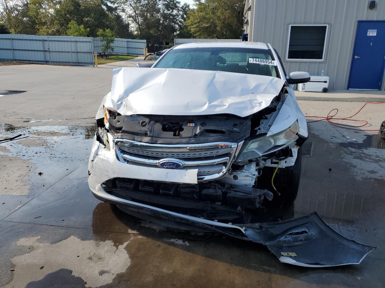 2011 Ford Taurus VIN 1FAHP2EW4BG183104 Copart auction photo, front end damage thumbnail 5