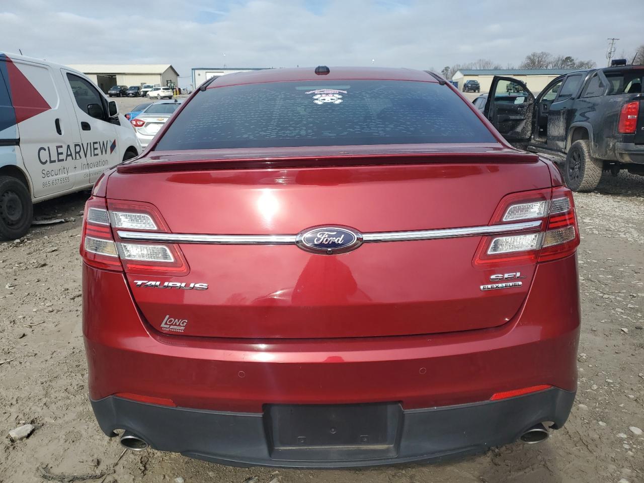 2015 Ford Taurus VIN 1FAHP2E80FG169305 Copart auction photo, side / front end damage thumbnail 6