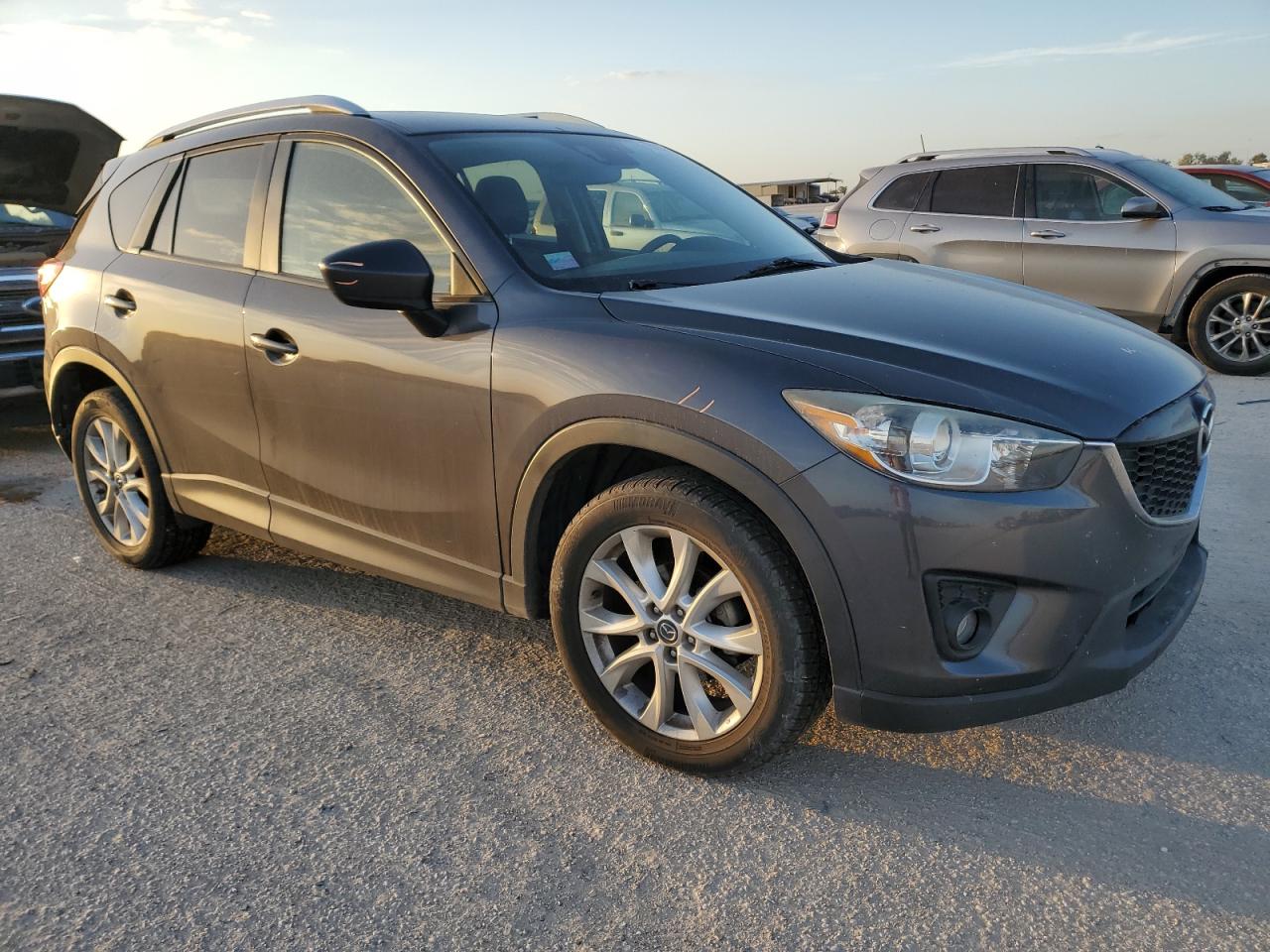 2014 Mazda CX-5 VIN JM3KE2DY0E0303039 Copart auction photo, rear end / minor dent/scratches damage thumbnail 4