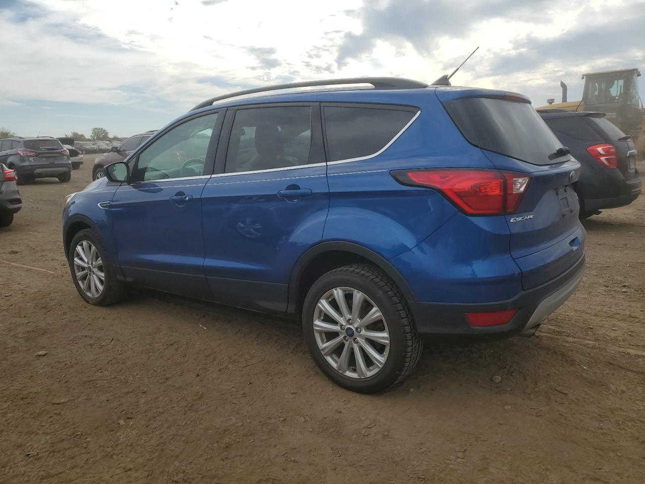 2019 Ford Escape VIN 1FMCU9HD3KUB97492 Copart auction photo, side / minor dent/scratches damage thumbnail 2