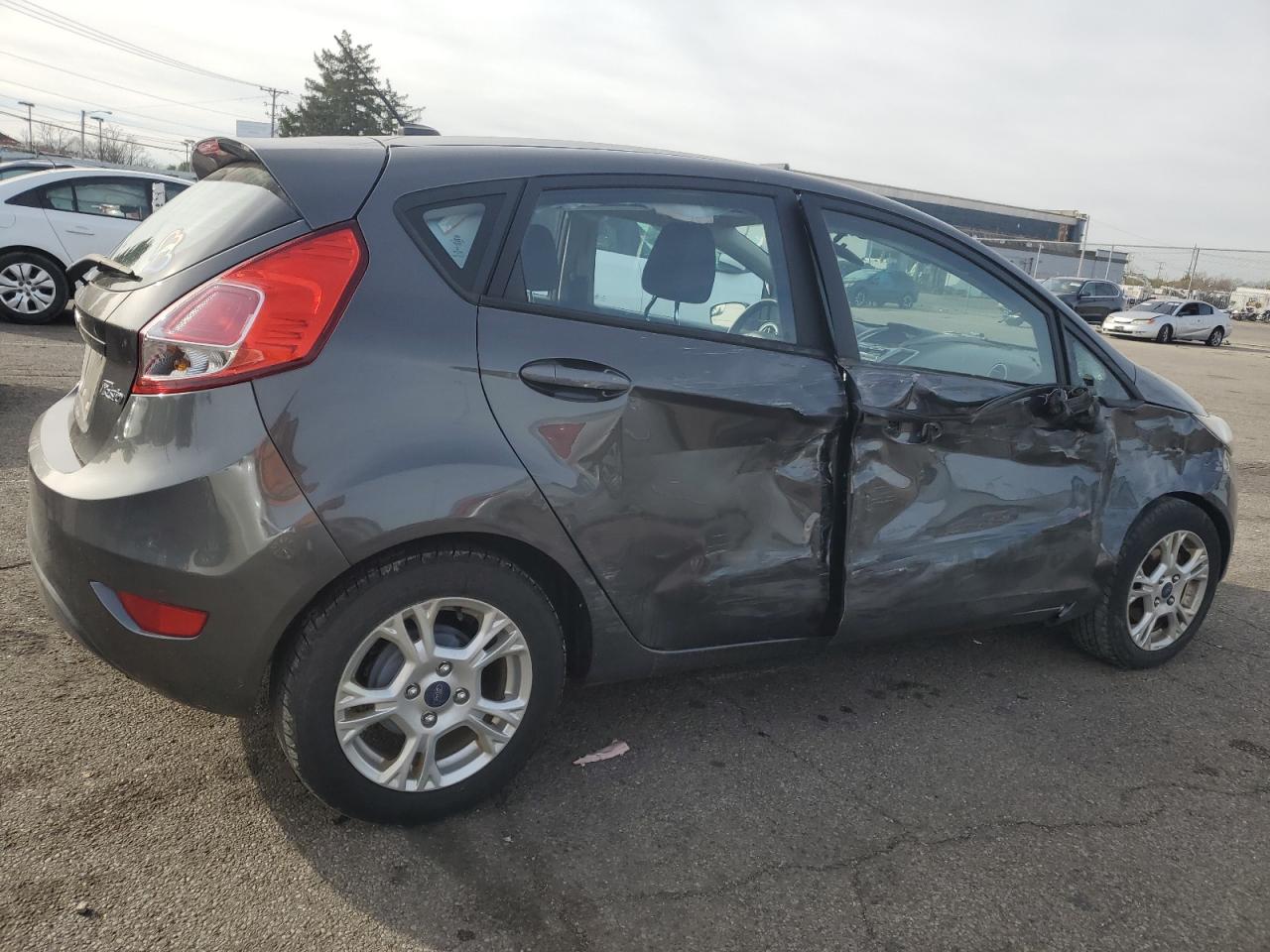 2016 Ford Fiesta VIN 3FADP4EJ3GM111189 Copart auction photo, all over damage thumbnail 3