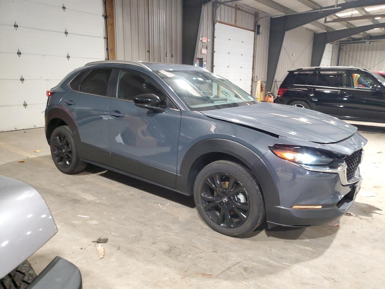 2023 Mazda CX-30 VIN 3MVDMBCM5PM565690 Copart auction photo, front end / rear end damage thumbnail 4