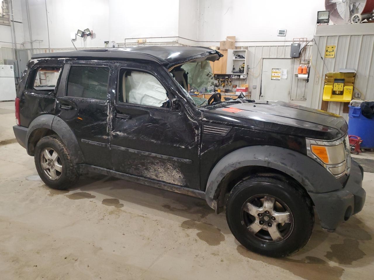 2007 Dodge Nitro VIN 1D8GU28K17W569551 Copart auction photo, all over damage thumbnail 4