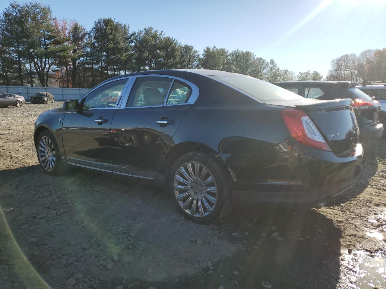 2013 Lincoln MKS VIN 1LNHL9EKXDG601790 Copart auction photo, rear end damage thumbnail 2
