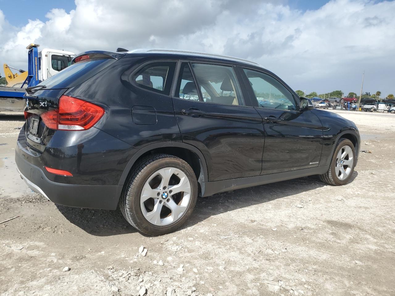2015 BMW X1 VIN WBAVM1C55FV318602 Copart auction photo, minor dent/scratches damage thumbnail 3