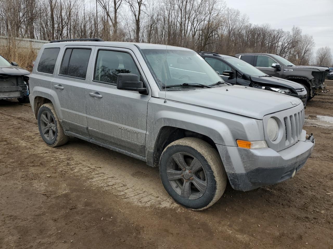 2014 Jeep Liberty (Patriot) VIN 1C4NJPFB4ED889261 Copart auction photo, front end / minor dent/scratches damage thumbnail 4