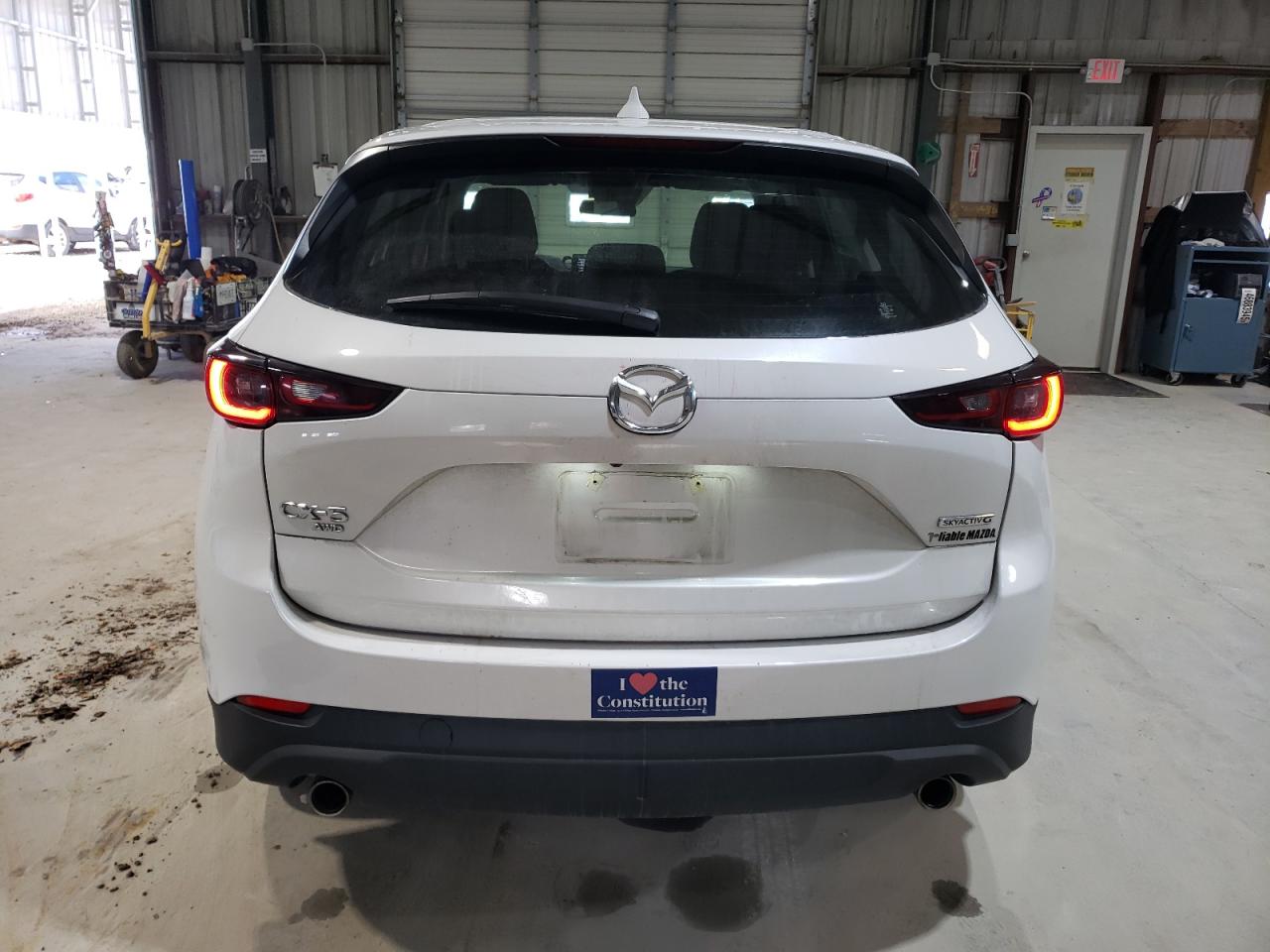 2023 Mazda CX-5 VIN JM3KFBAM2P0170852 Copart auction photo, front end / minor dent/scratches damage thumbnail 6