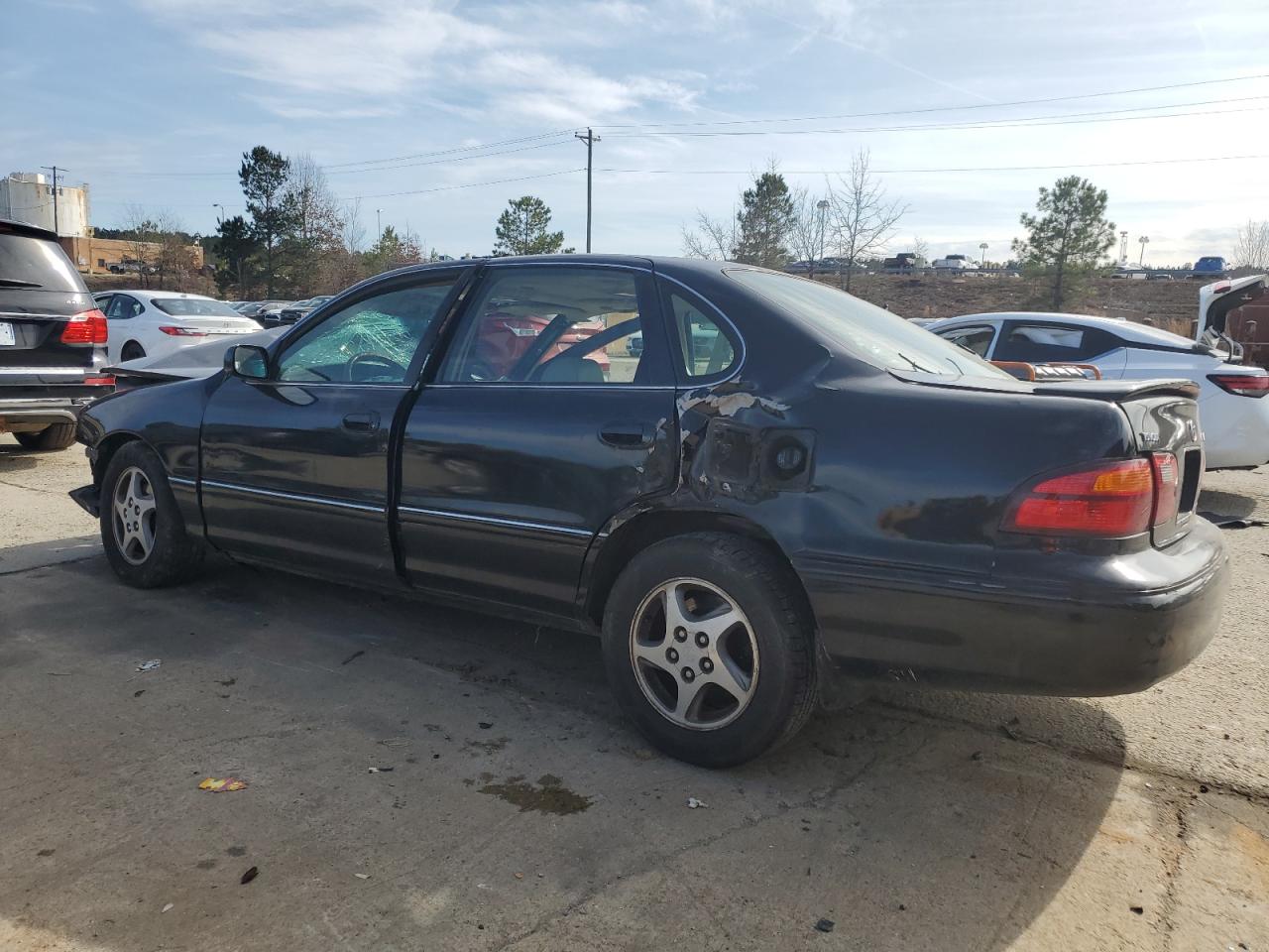 1999 Toyota Avalon VIN 4T1BF18B3XU296293 Copart auction photo, all over damage thumbnail 2