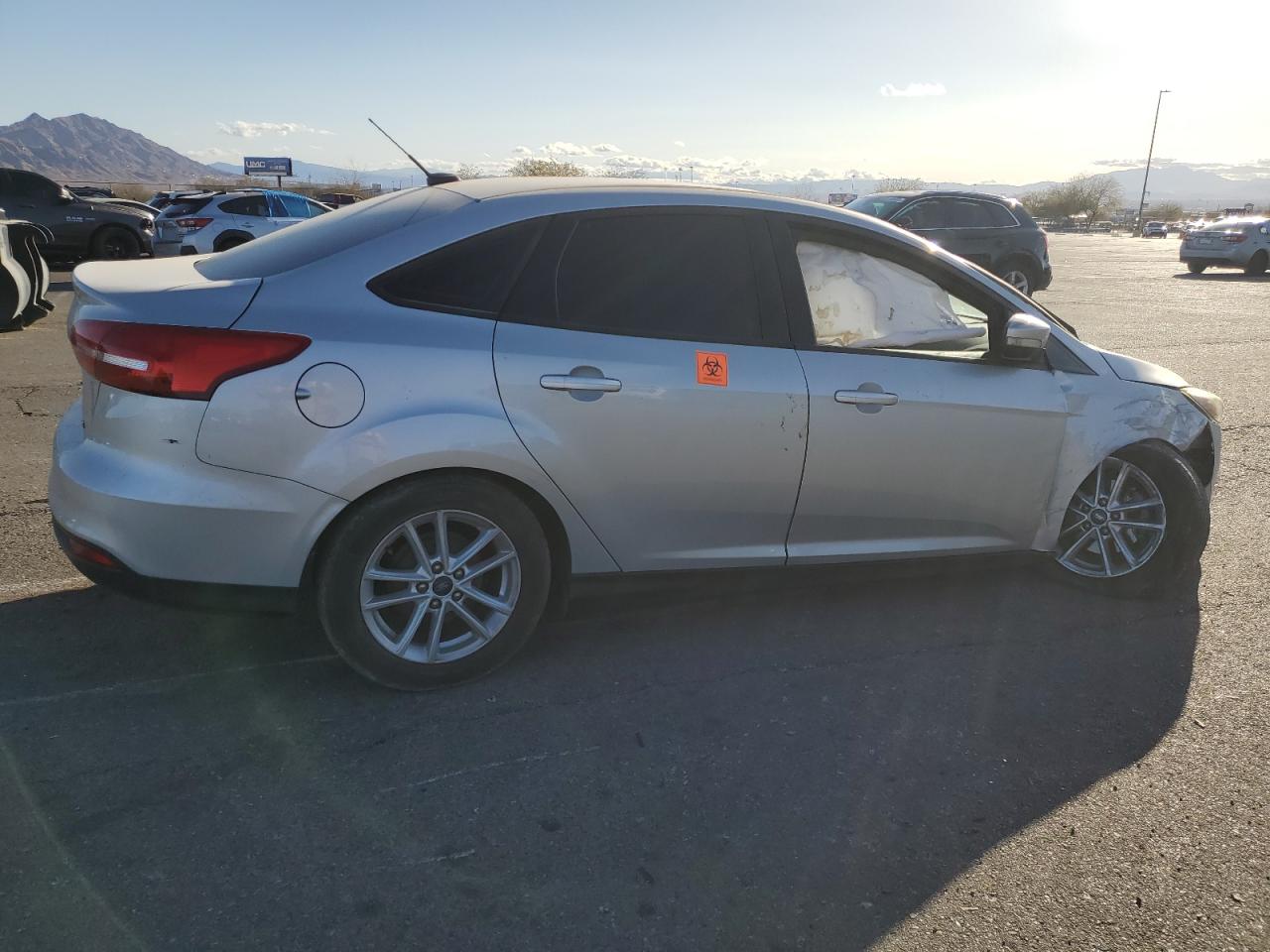 2016 Ford Focus VIN 1FADP3F26GL289830 Copart auction photo, all over damage thumbnail 3