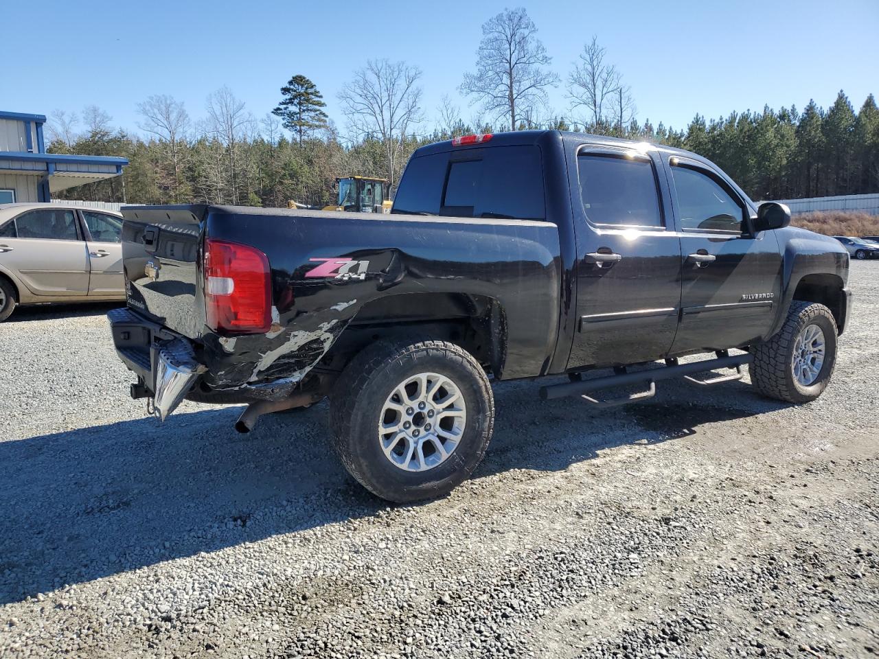 2011 Chevrolet Silverado VIN 3GCPKSE33BG347604 Copart auction photo, rear end / undercarriage damage thumbnail 3