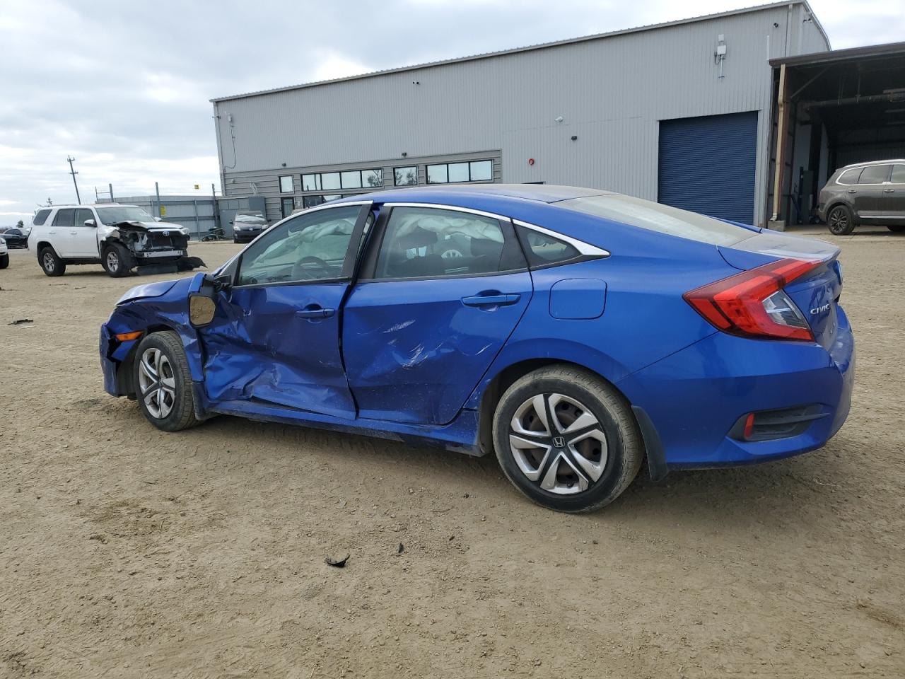 2017 Honda Civic VIN 19XFC2F52HE210280 Copart auction photo, side / front end damage thumbnail 2