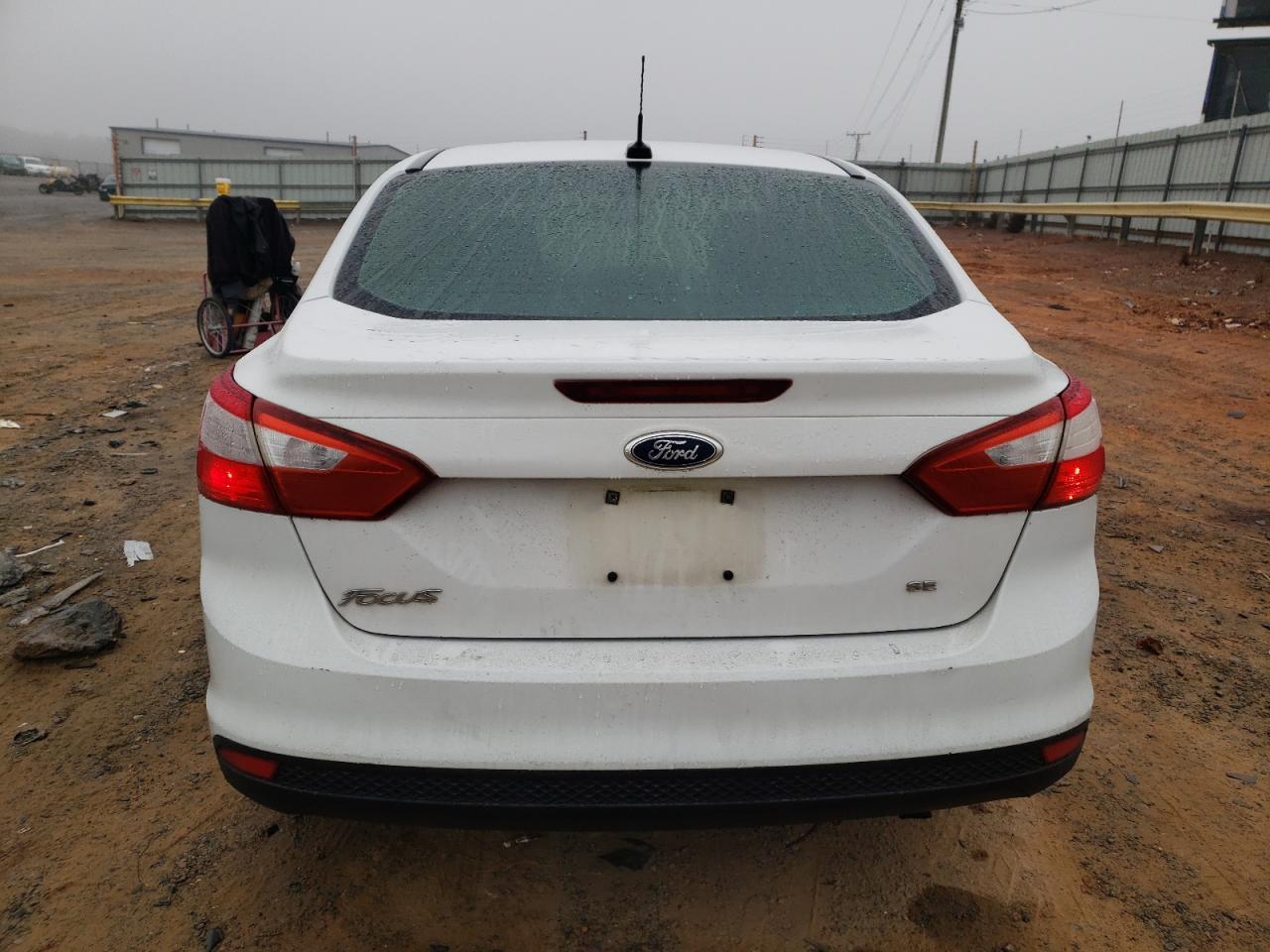 2012 Ford Focus VIN 1FAHP3F26CL344174 Copart auction photo, front end / undercarriage damage thumbnail 6