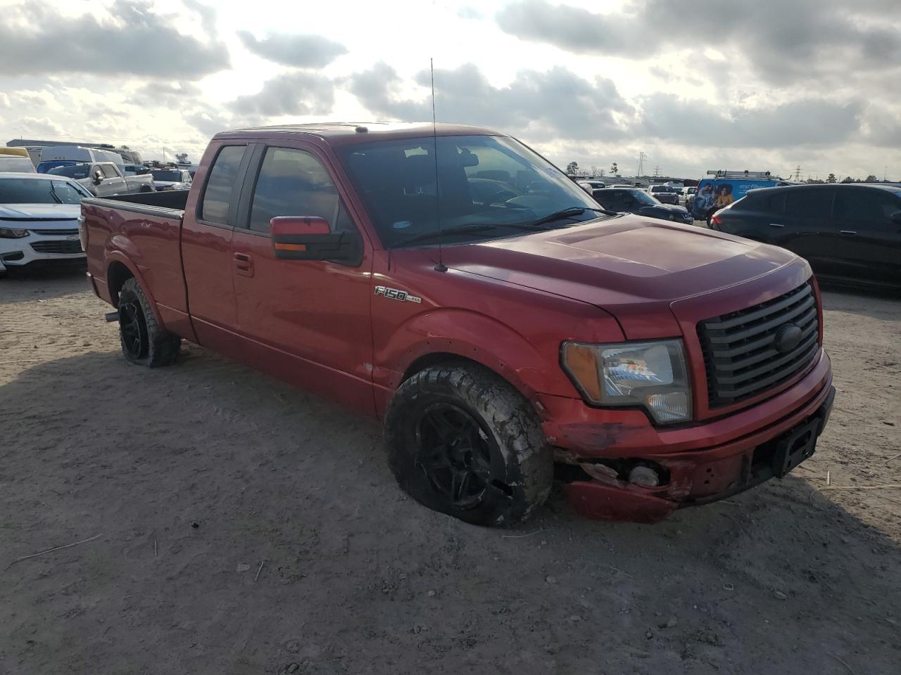 2010 Ford F-150 VIN 1FTEX1C80AKE53839 Copart auction photo, front end / side damage thumbnail 4
