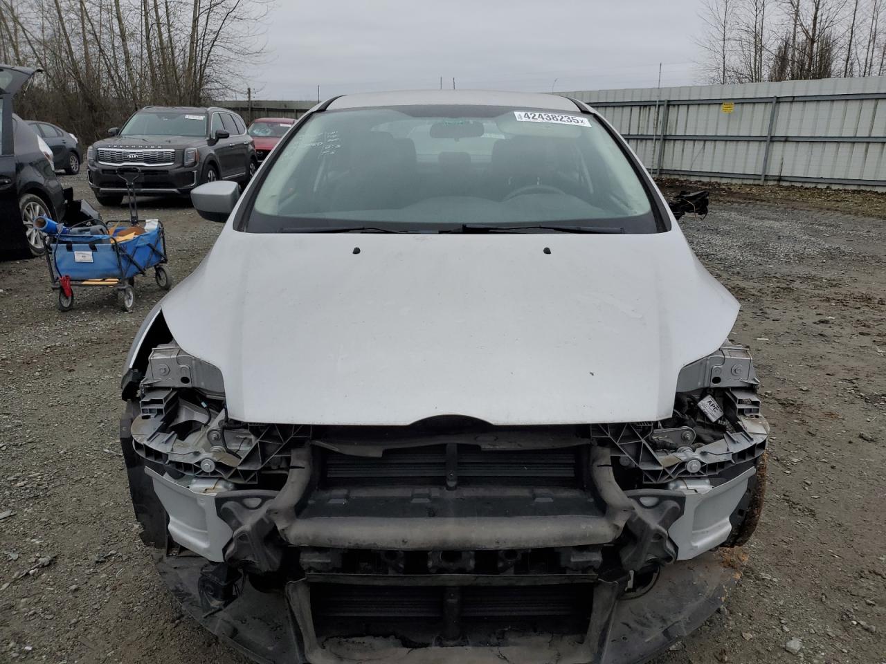 2012 Ford Focus VIN 1FAHP3F24CL240590 Copart auction photo, front end damage thumbnail 5