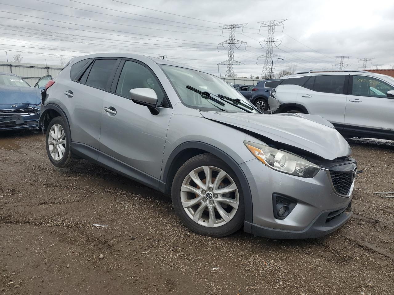 2014 Mazda CX-5 VIN JM3KE2DY0E0327308 Copart auction photo, all over / undercarriage damage thumbnail 4