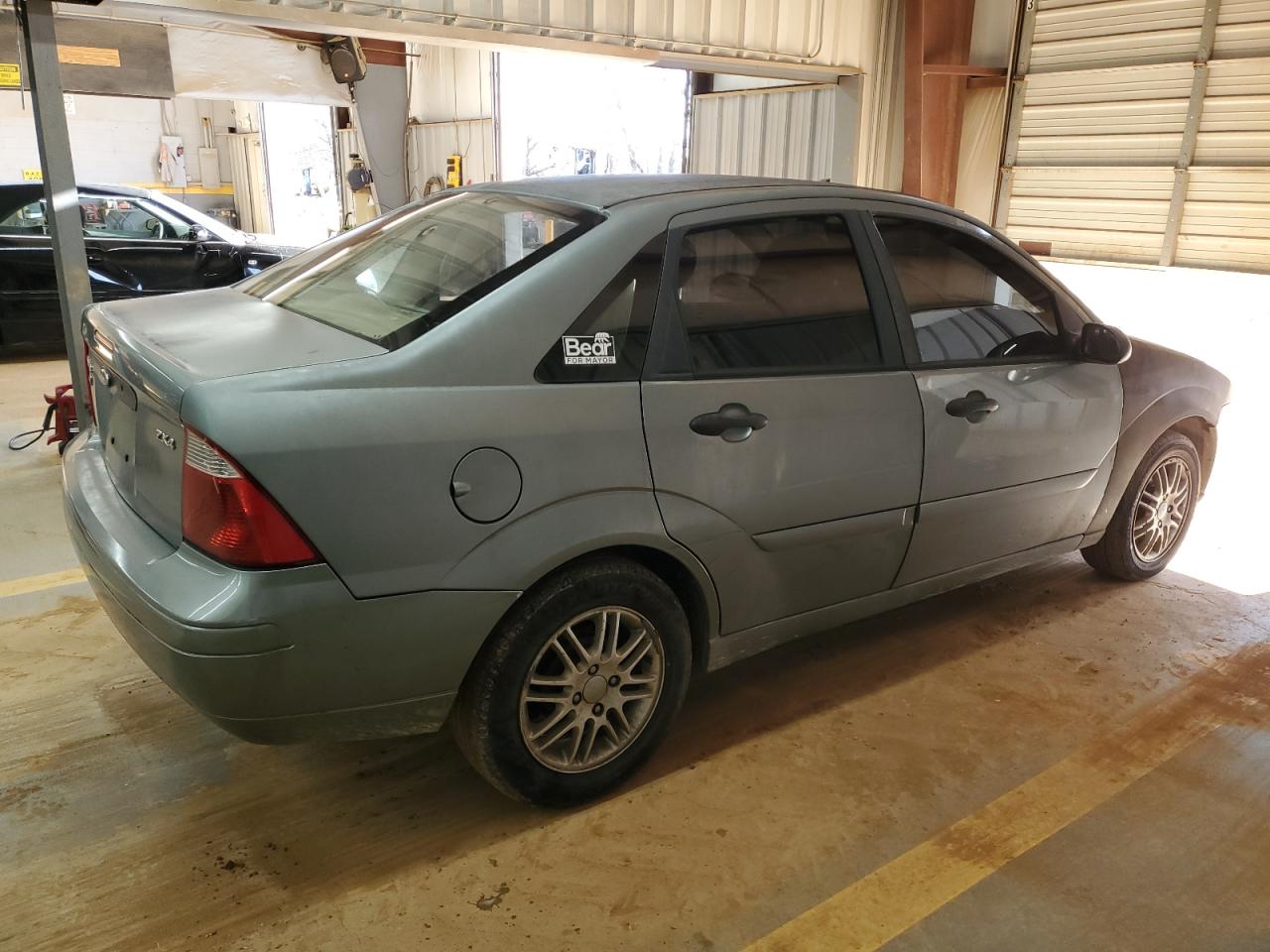 2005 Ford Focus VIN 1FAFP34N35W238108 Copart auction photo, side damage thumbnail 3