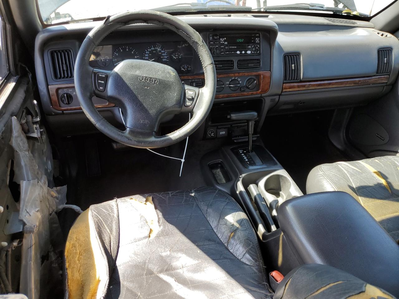1998 Jeep Grand Cherokee VIN 1J4FX58S3WC144586 Copart auction photo, side / minor dent/scratches damage thumbnail 8