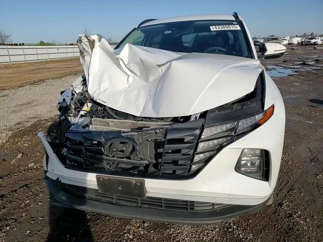 2022 Hyundai Tucson VIN 5NMJB3AEXNH003828 Copart auction photo, front end / side damage thumbnail 10