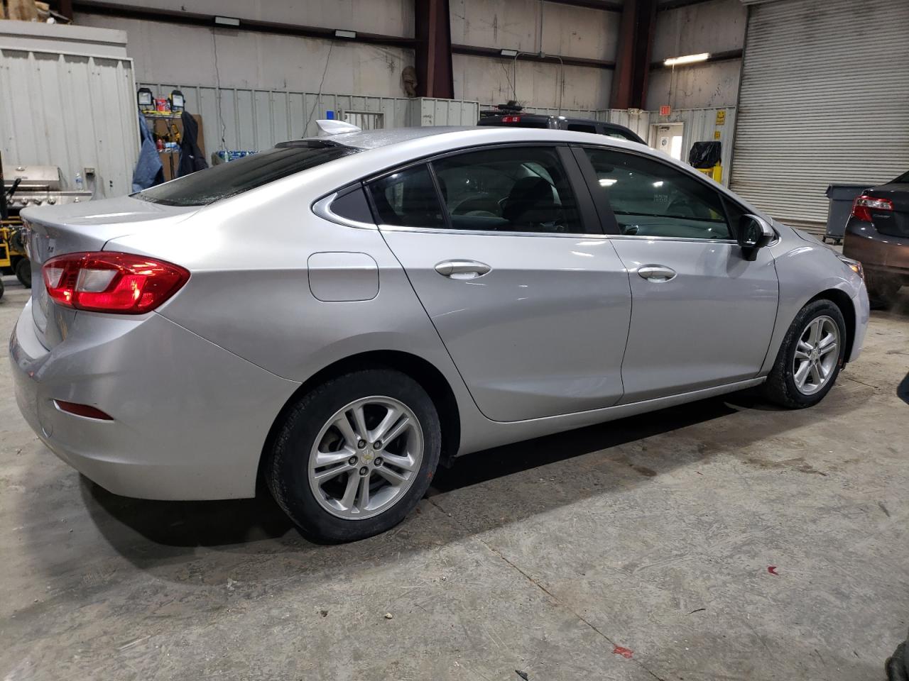 2016 Chevrolet Cruze VIN 1G1BE5SM9G7230704 Copart auction photo, side / front end damage thumbnail 3