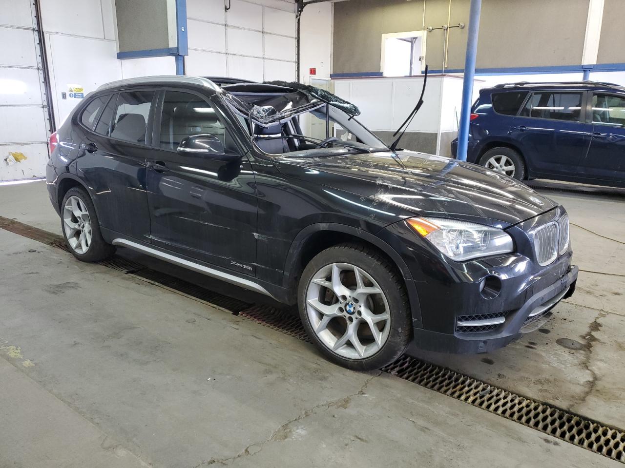 2014 BMW X1 VIN WBAVM5C52EVV91454 Copart auction photo, rollover / undercarriage damage thumbnail 4
