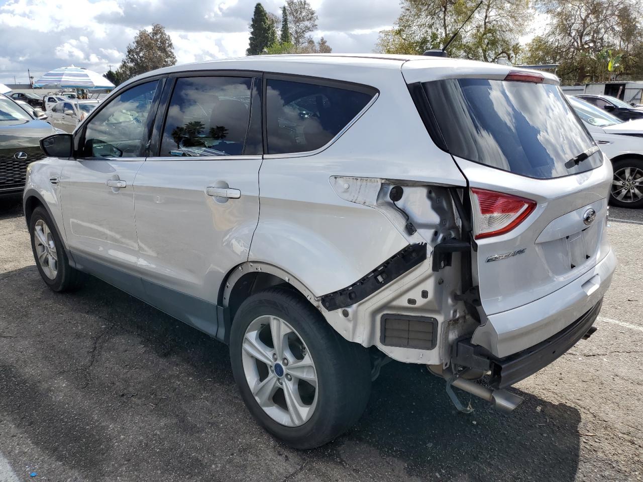 2015 Ford Escape VIN 1FMCU0G98FUB32586 Copart auction photo, rear end / side damage thumbnail 2