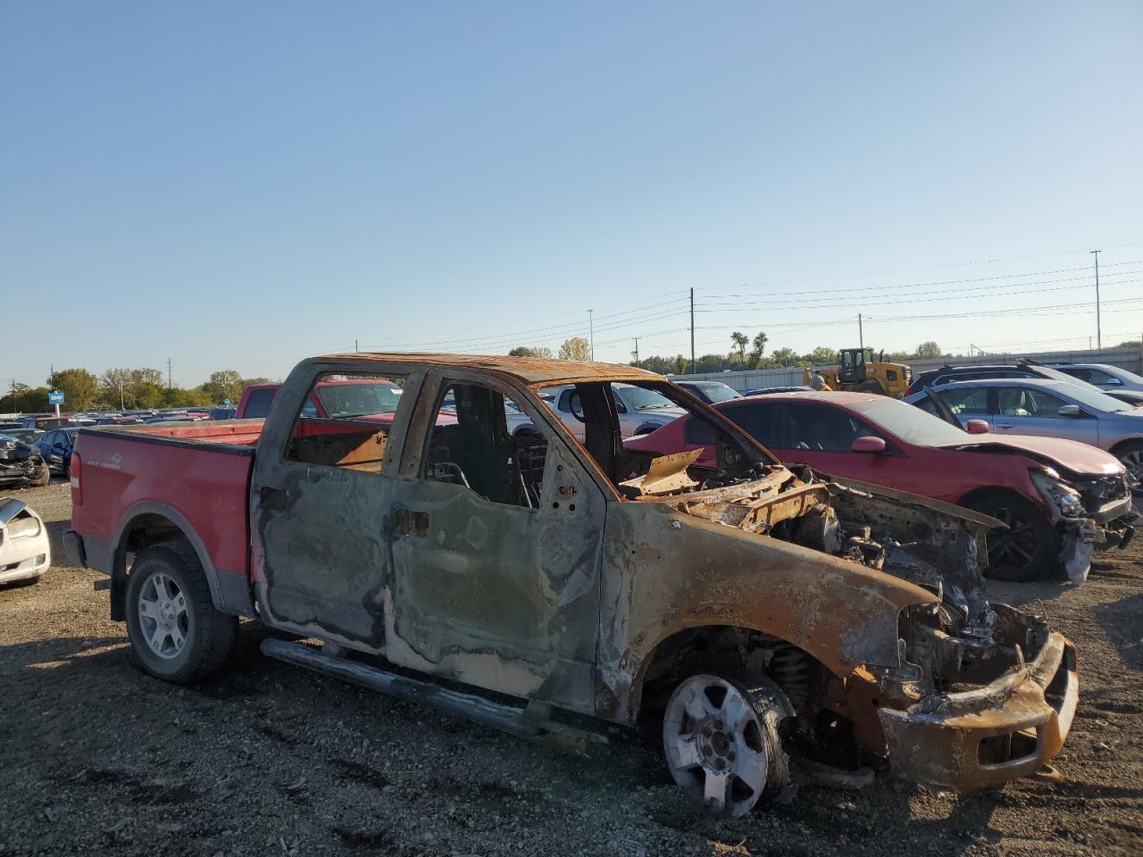 2005 Ford F-150 VIN 1FTPW14505FA96175 Copart auction photo, burn damage thumbnail 4