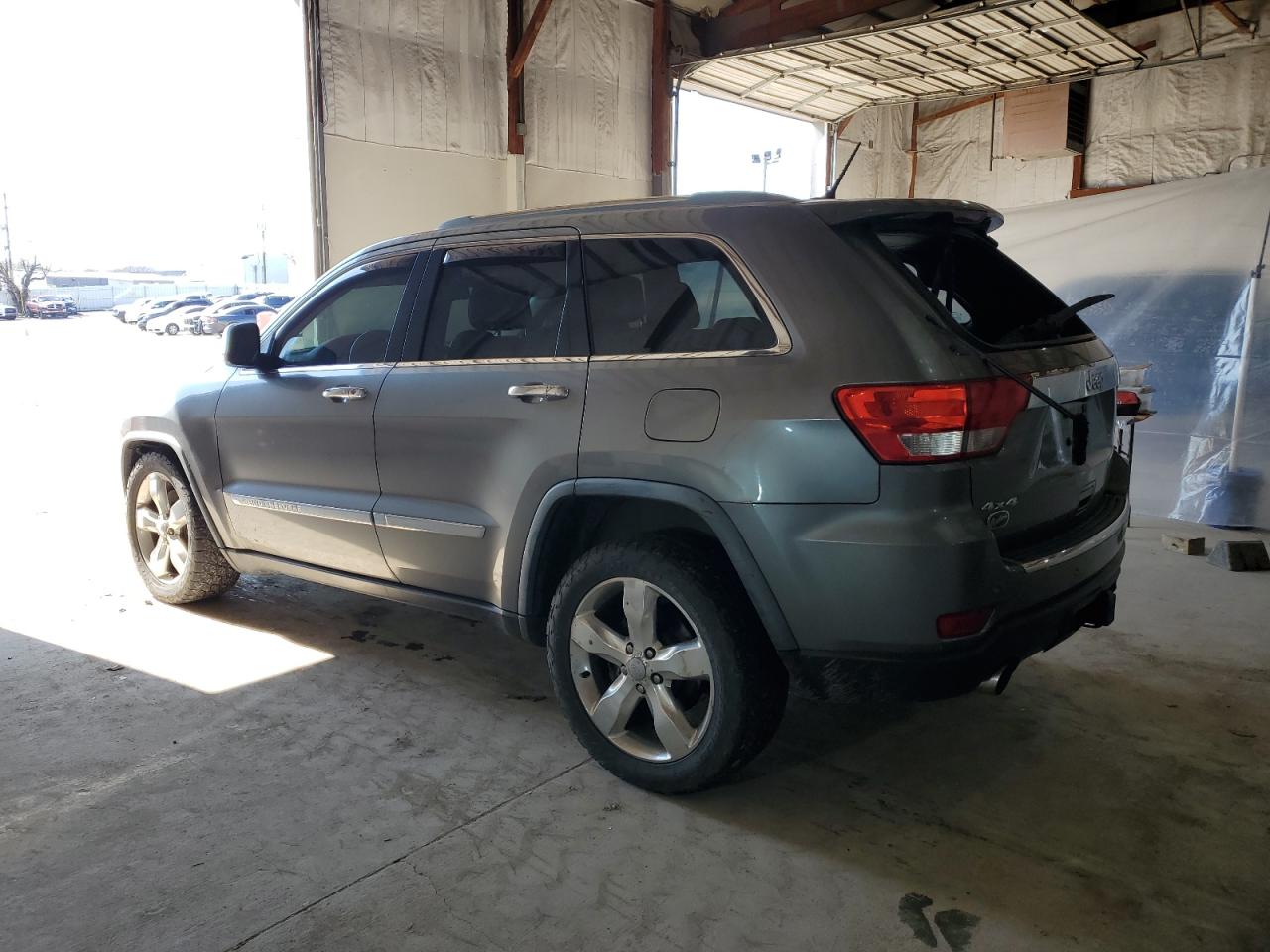 2012 Jeep Grand Cherokee VIN 1C4RJFCTXCC132330 Copart auction photo, rear end / side damage thumbnail 2