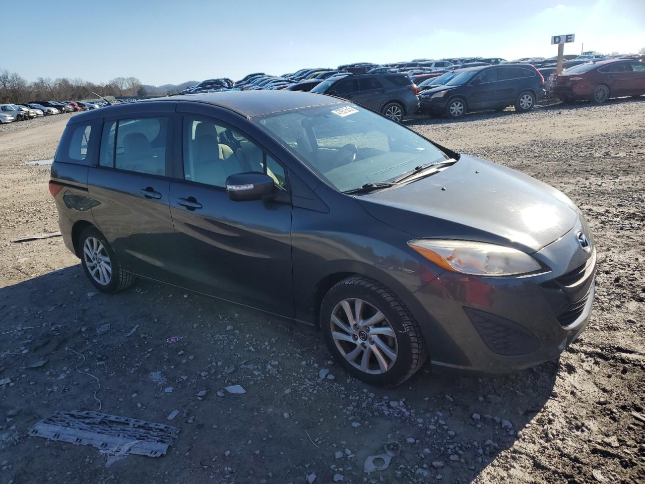 2015 Mazda 5 VIN JM1CW2BL1F0185960 Copart auction photo, side damage thumbnail 4