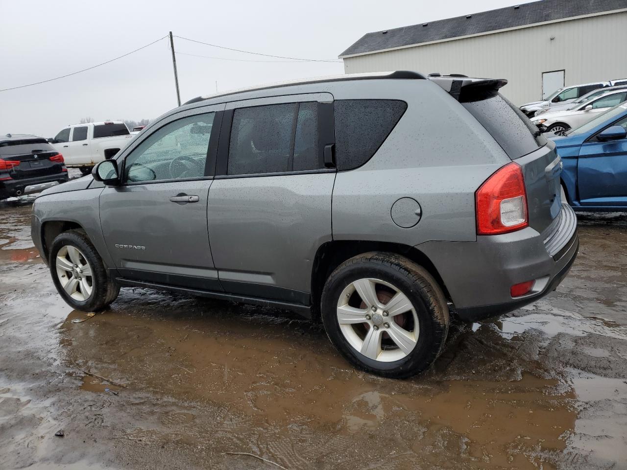 2011 Jeep Compass VIN 1J4NT1FB2BD252754 Copart auction photo, side damage thumbnail 2