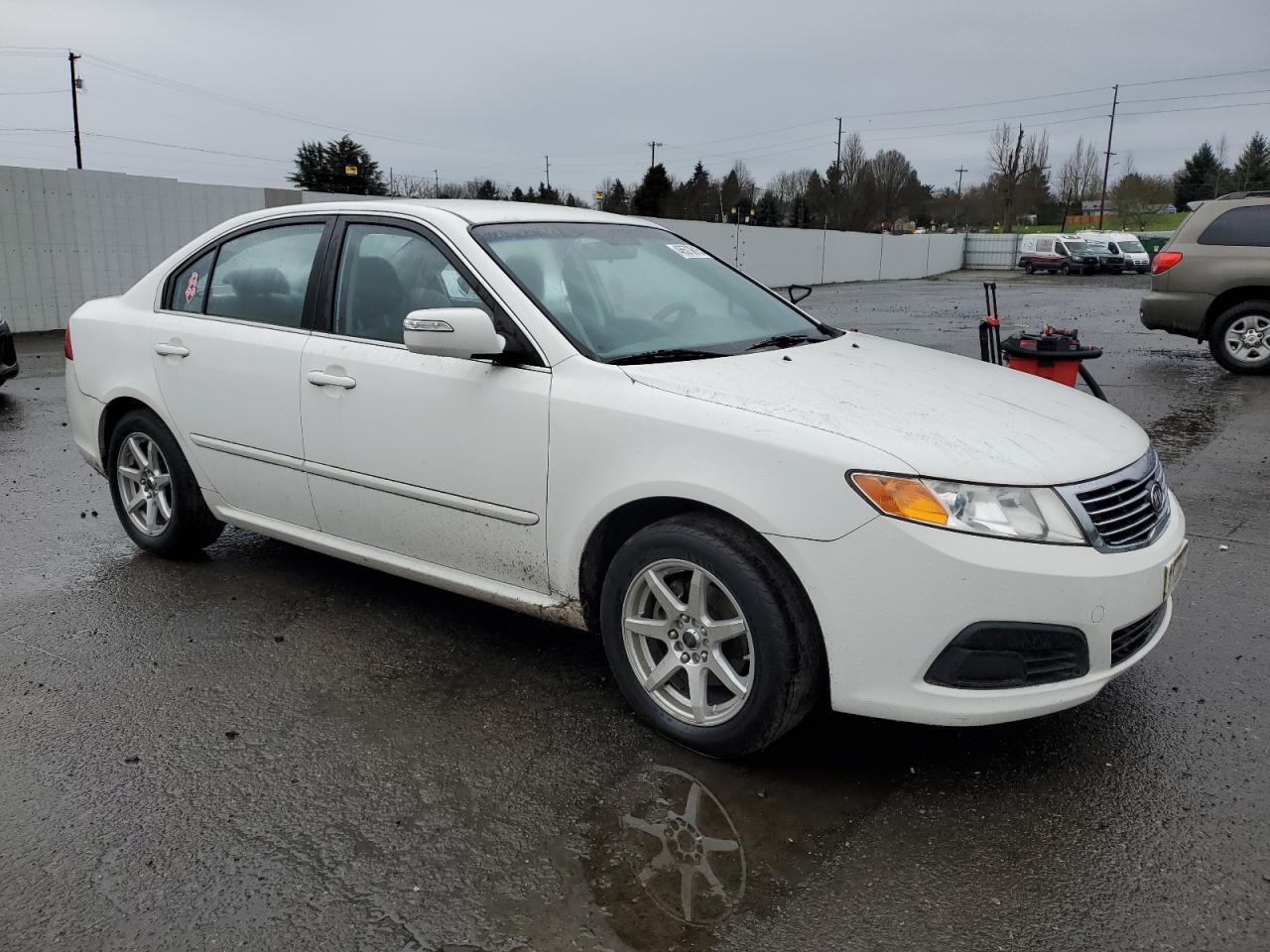 2009 KIA Optima VIN KNAGE228X95292770 Copart auction photo, side / vandalism damage thumbnail 4