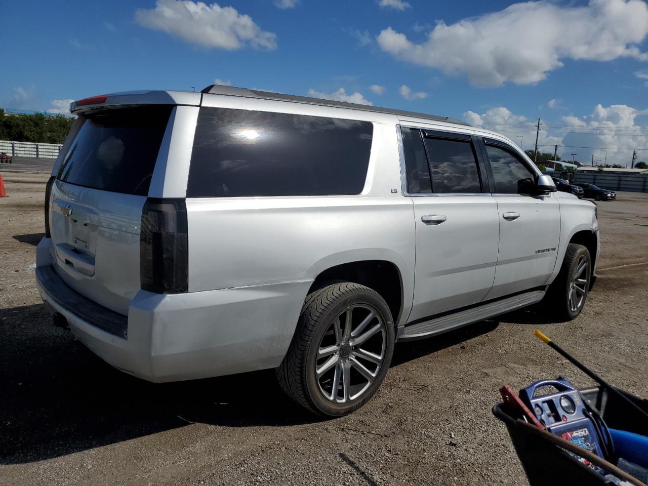 2015 Chevrolet Suburban VIN 1GNSCHKC0FR142513 Copart auction photo, all over / undercarriage damage thumbnail 3